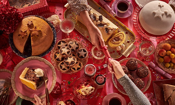 Beautiful food laid out on a Christmas themed table